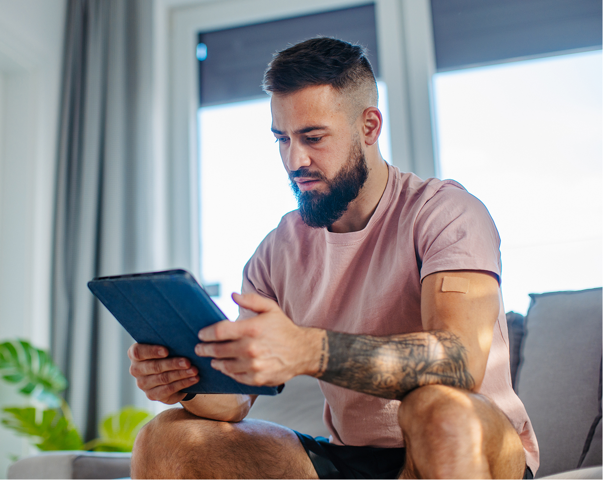 Person reviewing nicotine replacement bundle options on a tablet